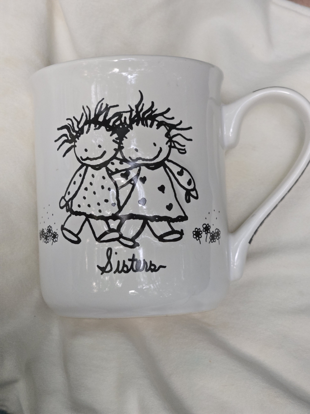 White 'Sisters' Illustrated Ceramic Mug - Black Artwork Enesco